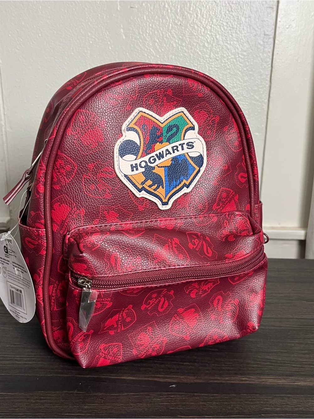 Maroon red faux leather Harry Potter Hogwarts mini backpack ft crest applique